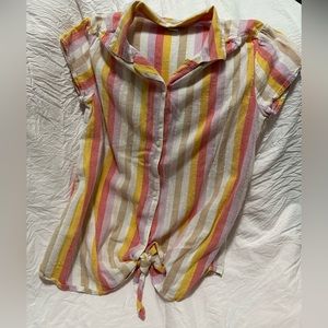 Red, pink, crème, and white shirt with striped and four buttons.